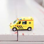 Image of toy ambulance on steps