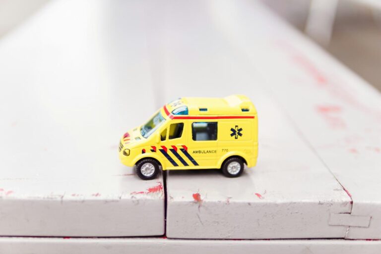 Image of toy ambulance on steps