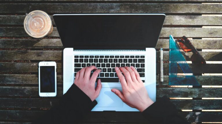 Man working at computer. Image credit: Stanley Dai on Unsplash